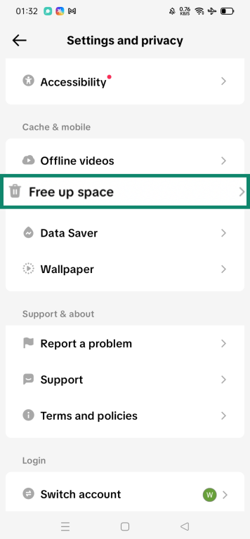 TikTok Settings and privacy screen showing the Free up space option highlighted.