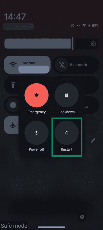 Android interface showing the power options menu and the restart option.