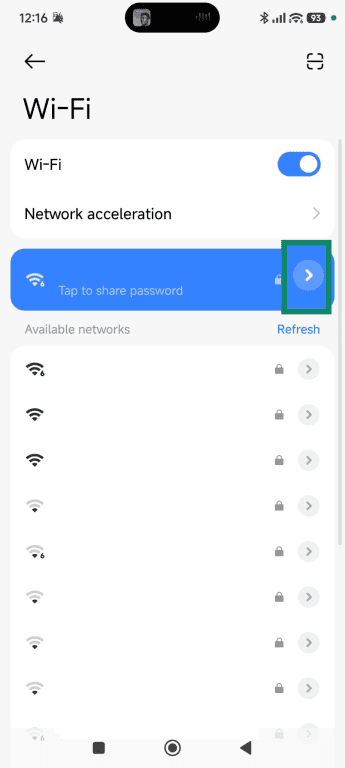 The arrow next to the active Wi-Fi name is highlighted.