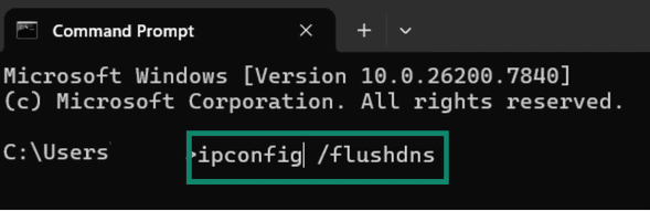 Windows CMD window showing the command ipconfig /flushdns.